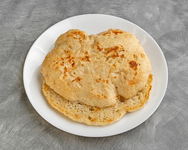 Fresh golden lepinja flatbread